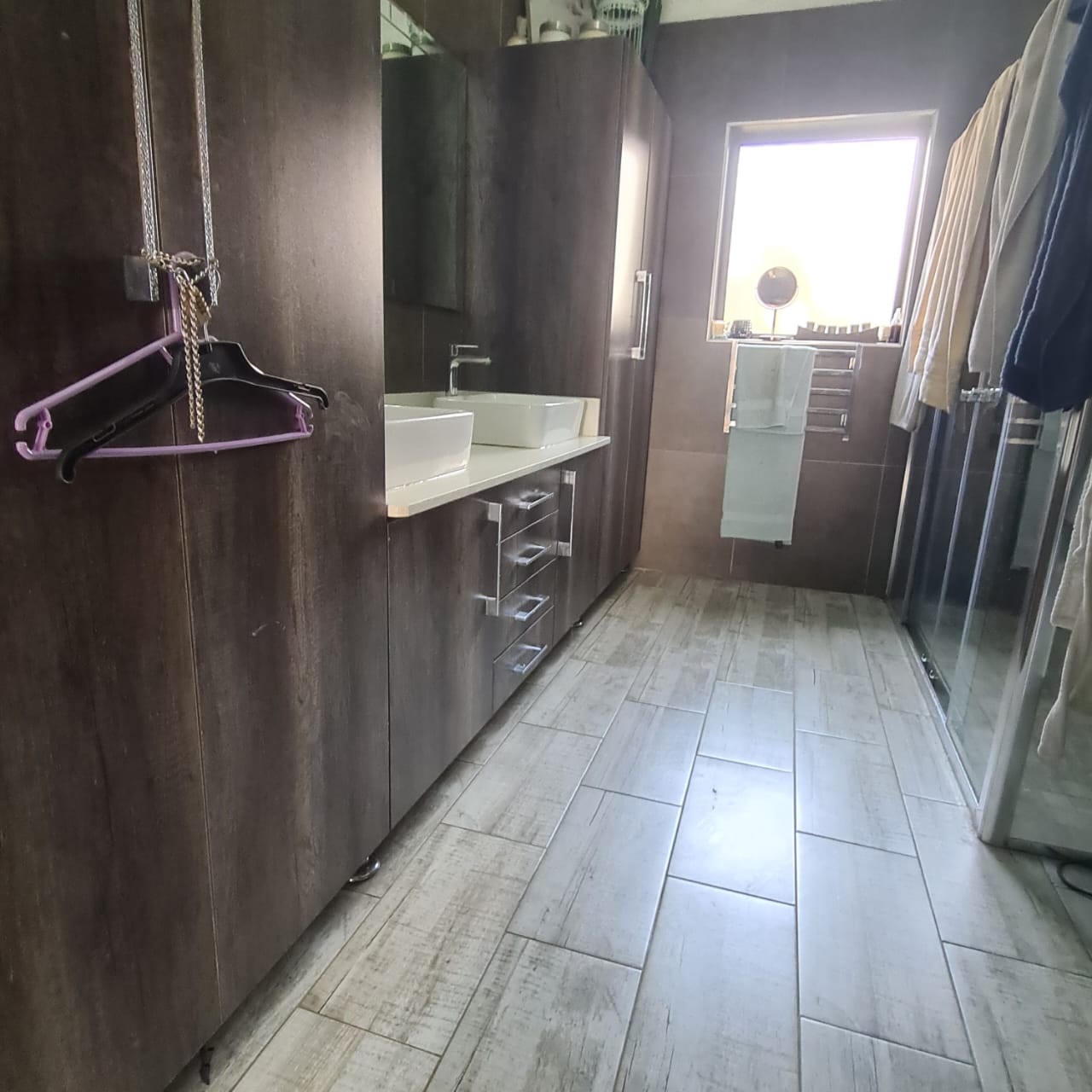 Full-wall bathroom vanity and storage, Mbombela