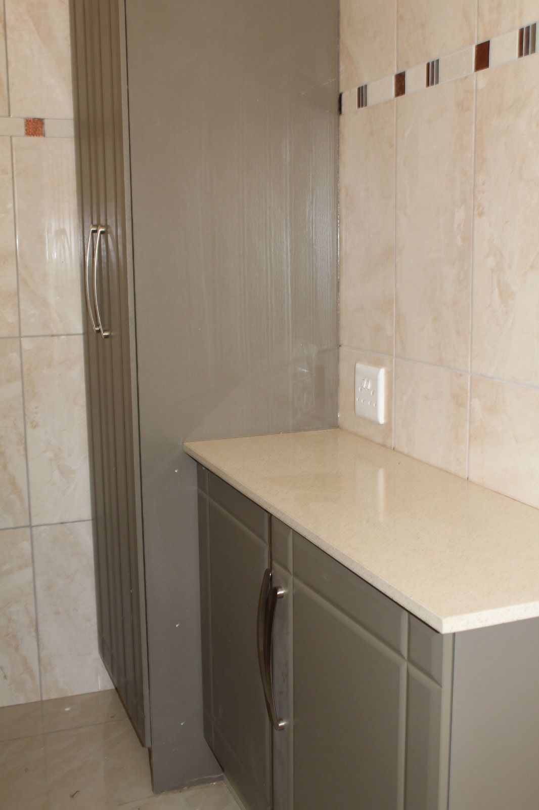 Pantry cupboard with quartz countertop